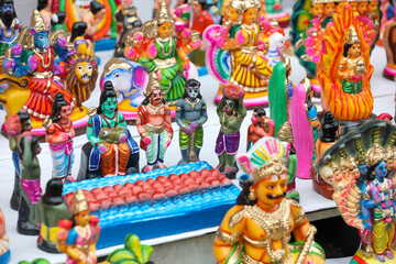 Fototapeta premium Hindu epic Ramayana floating bridge scene idols displayed for sale in a shop for the golu festival 