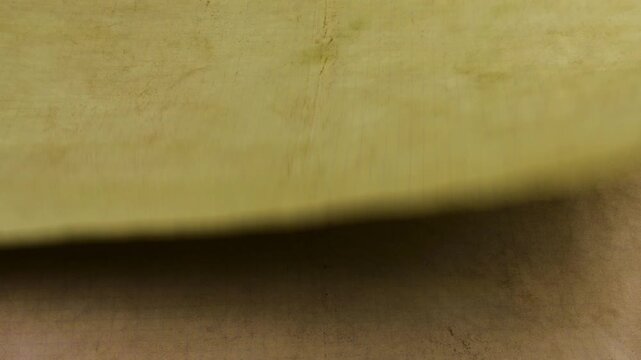 Sheets of eco recycled material are laid one on top of another to create a unique handmade background. The grunge background features a distinct kraft paper texture.