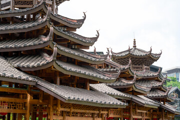 Ancient ethnic architecture of Fengyu Bridge at Folk Song Lake in Nanning, Guangxi, China © Steve
