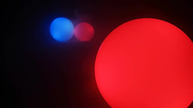 Colorful spheres against dark background