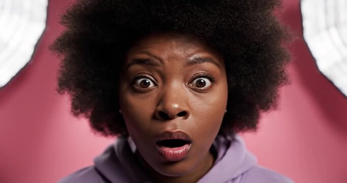 Young woman with surprised expression.