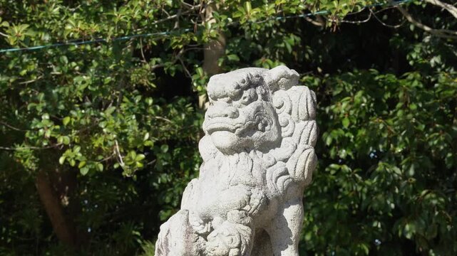 Komainu Lion Dog Stone Statue in Local Japanese Temple