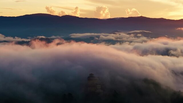 Baguio Benguet Philippines sunrise clouds move gently over misty highlands