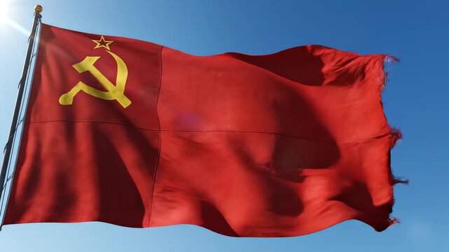 Red flag with hammer and sickle waving