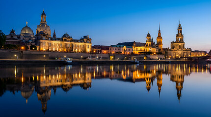 Fototapeta premium Illuminated Dresden Skyline with Frauenkirche Reflection at Blue Hour – Iconic German Cultural Heritage Concept