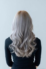 Naklejka premium Long Wavy Ash Blonde Hair Woman Back View