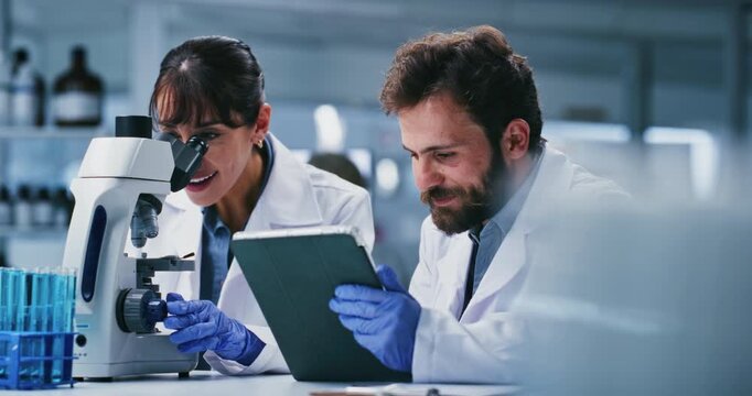 Microscope, talking and people on tablet in lab for online report, medical study and experiment results. Healthcare, teamwork and scientists on tech for clinical trial, stem cell research and vaccine