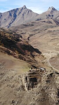 Aerial view of caucasus mountains and ancient village. Media