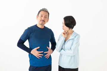 Fototapeta premium 肥満を気にする男性