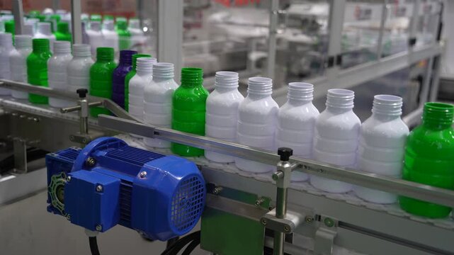 conveyor line for the production of plastic bottles close-up