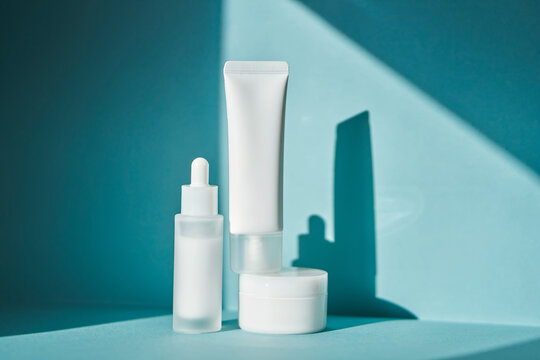 Skincare beauty products in natural light creating shadows