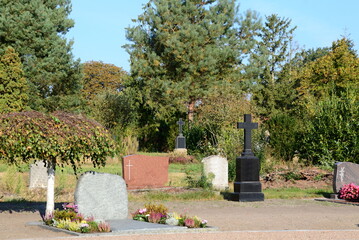 Cemetery in Autumn in the Village H&auml;uslingen, Lower Saxony