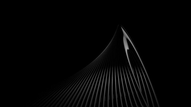 Low key abstract view of a sleek ribbed architectural structure with smooth curved edge emerging from black background emphasizing texture depth and modern design