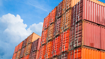 Fototapeta premium Cargo ship container goods export import international transport on blue sky background, warehouse industry business logistics transportation harbor port industrial shipping terminal cargo ship.