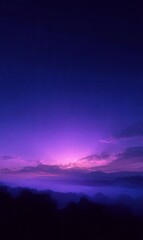 Obraz premium Sunset over the mountains beneath a dramatic cloudy night sky