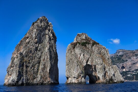 two of the most famous rocks on the island of Capri, the Faraglioni