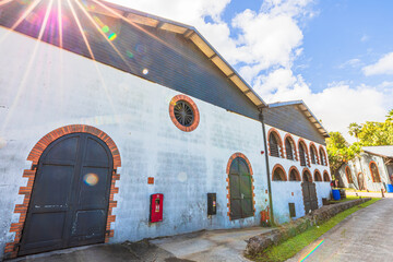 Fototapeta premium Martinique, French Antilles - Dec 20, 2025: Habitation Saint-Etienne historic building and rum distillery in Martinique, French Antilles, making the famous Rhum Agricole