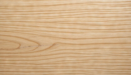 Light-colored wood surface shows smooth grain and lines. The scene highlights the texture and pattern typical of natural wood, taken indoors under good lighting