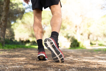 Male athlete running path for healthy workout