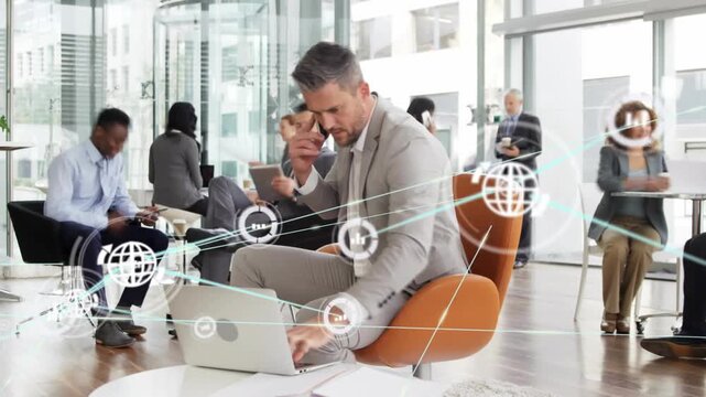 Exec toggling laptop and phone while answering call, AR graphics syncing, aiding document review