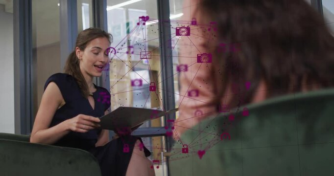 Interviewer referencing gray folder and starting business talk, purple icons overlaying, gesturing