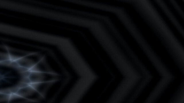 Abstract motion creates a mesmerizing background pattern with geometric shapes.