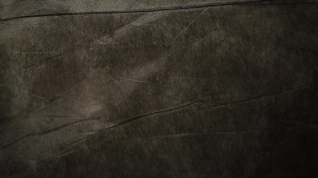 Black Wrinkled Canvas Fabric With Soft Wave Motion Background Video