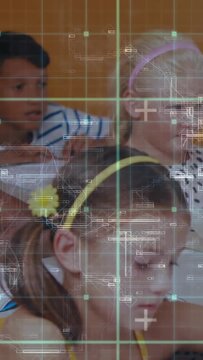 Vertical video: Camera panning right showing students writing, grid overlay on desks for education