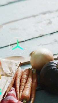 Vertical video: On play, teal icons hovering and pulsing above carrots and onion, marking produce