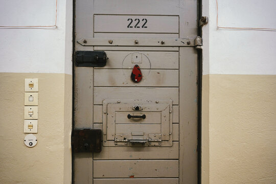 Closed cell door with number 222 in Hohenschoenhausen, a stasi prison in GDR, now a museum and memorial