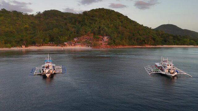 Drone aerial view of KMAAL campsite in Linapacan near Coron in The Philippines.