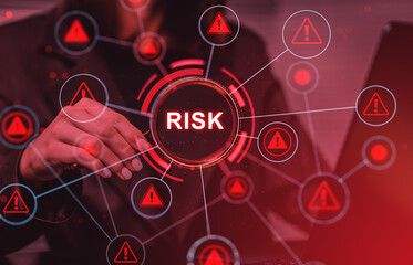 Fototapeta premium Businesswoman analyzing risk concept with digital warning symbols connected in red network on screen in modern creative interface design..