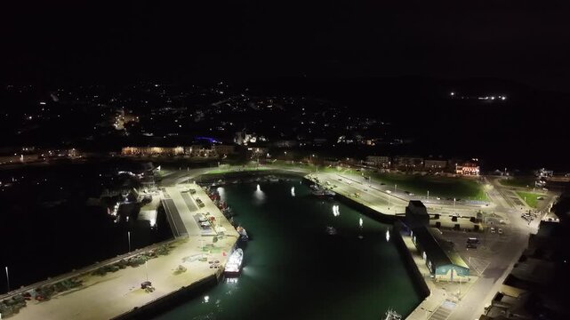 Aerial Night View of Howth Harbour in Dublin Bay, Ireland &ndash; 4K 60fps Drone Footage