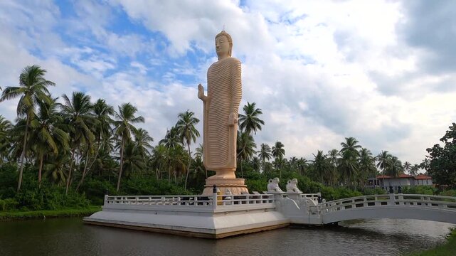 View on the Buddha sculpture in memory of the victims of the tsunami. Peralia, Sri Lanka