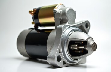 Automotive starter motor part. Metal component for car engine ignition. Electrical device for vehicle startup. Heavy machinery equipment detail.
