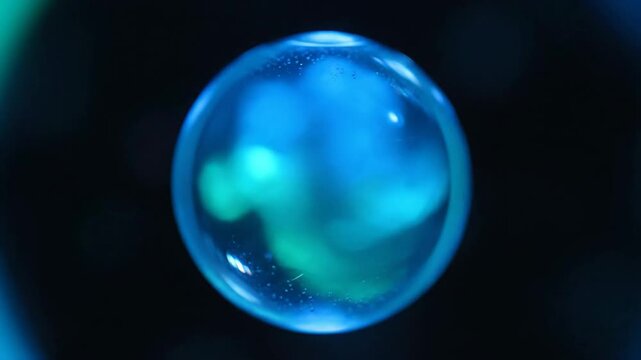 Abstract vision of a luminous sphere with swirling blue and green patterns, evoking a sense of cosmic discovery and scientific wonder, a microcosm of vibrant, ethereal energy