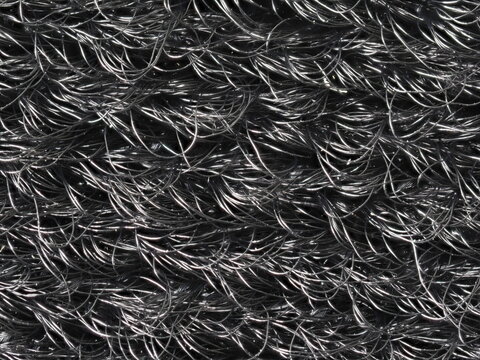 Macro photography of a black velcro hook and loop fastener texture