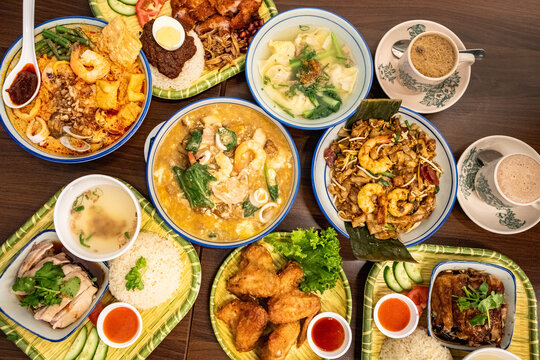 Traditional Southeast Asian Feast with Noodles, Rice and Seafood