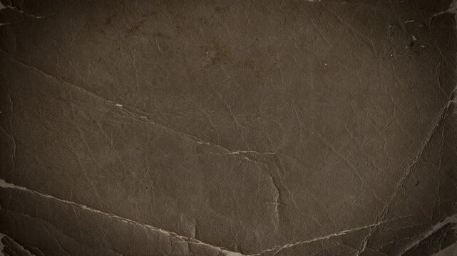 A creased and textured paper tear reveal background with alpha that animates to fill screen in a stop motion style. 
