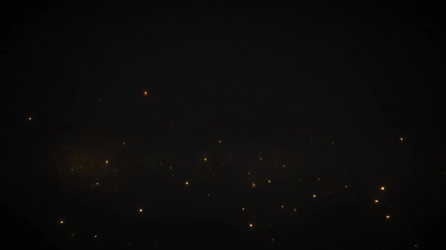 A starry night sky with numerous twinkling stars visible in the darkness, capturing the celestial beauty from a terrestrial viewpoint.