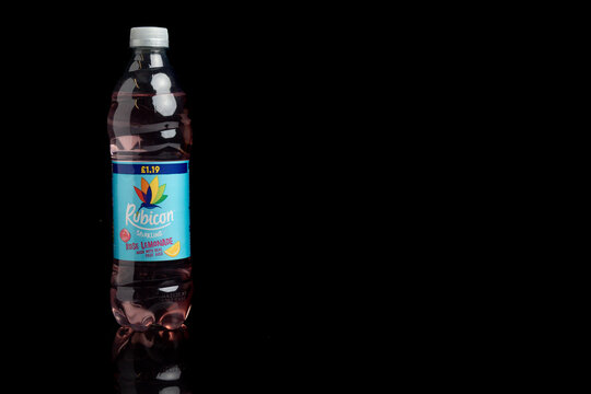 A Bottle of Rubicon Sparkling Rose Lemonade against a black background