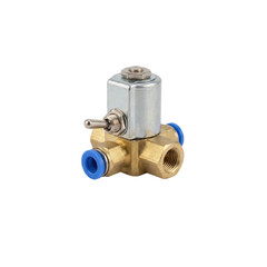 Industrial brass pneumatic component valve with metal toggle actuator and blue push fittings creating functional mechanical detail and subtle