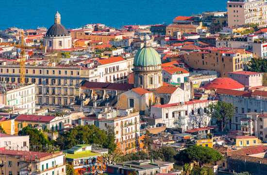 Cityscape of Naples, Italy with traditional old Italian architrcture, Tyrrhenian Sea during summer sunny day