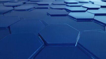 Obraz premium A close-up view of a field of glossy, blue hexagonal shapes. They reflect light