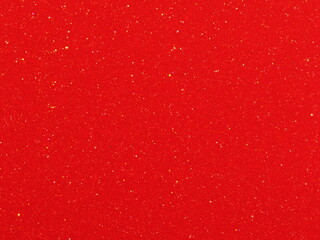 Macro photography of bright red metallic paint texture with fine sparkles © Remek