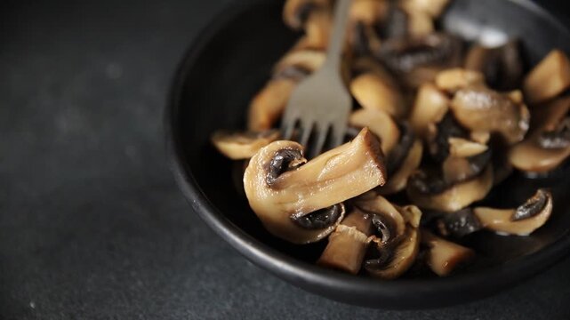 Champignon mushrooms ready to eat tasty snack fresh gourmet food background on the table rustic food top view copy space keto and paleo diet vegetarian and vegan food marketing concept photo