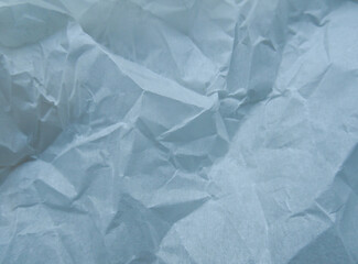 Obraz premium Crumpled Blue Paper Texture Overlay – Realistic Wrinkled Paper Background