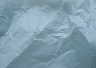 Obraz premium Crumpled Blue Paper Texture Overlay – Realistic Wrinkled Paper Background