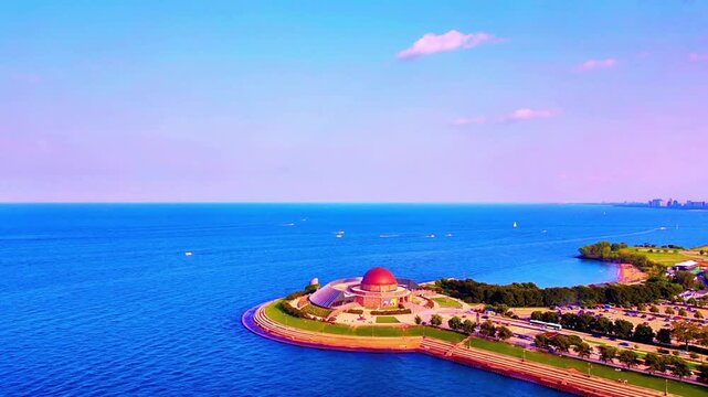 A smooth drone flight over Lake Michigan revealing the iconic Adler Planetarium along the shoreline, with the Chicago skyline rising dramatically in the background for a stunning cinematic view.