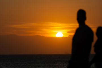 Couple watches the sunset